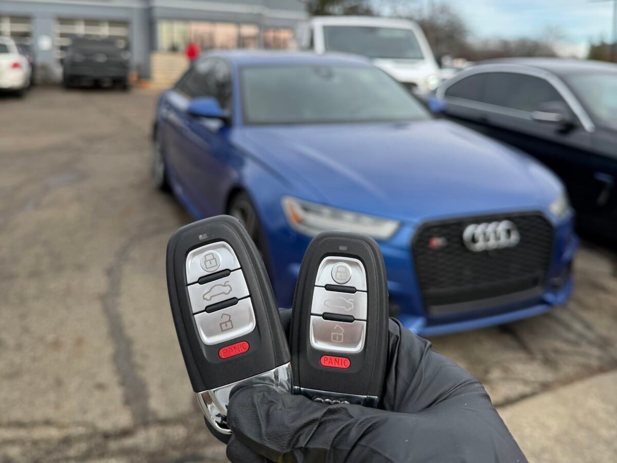 Key programming equipment connected to a vehicle